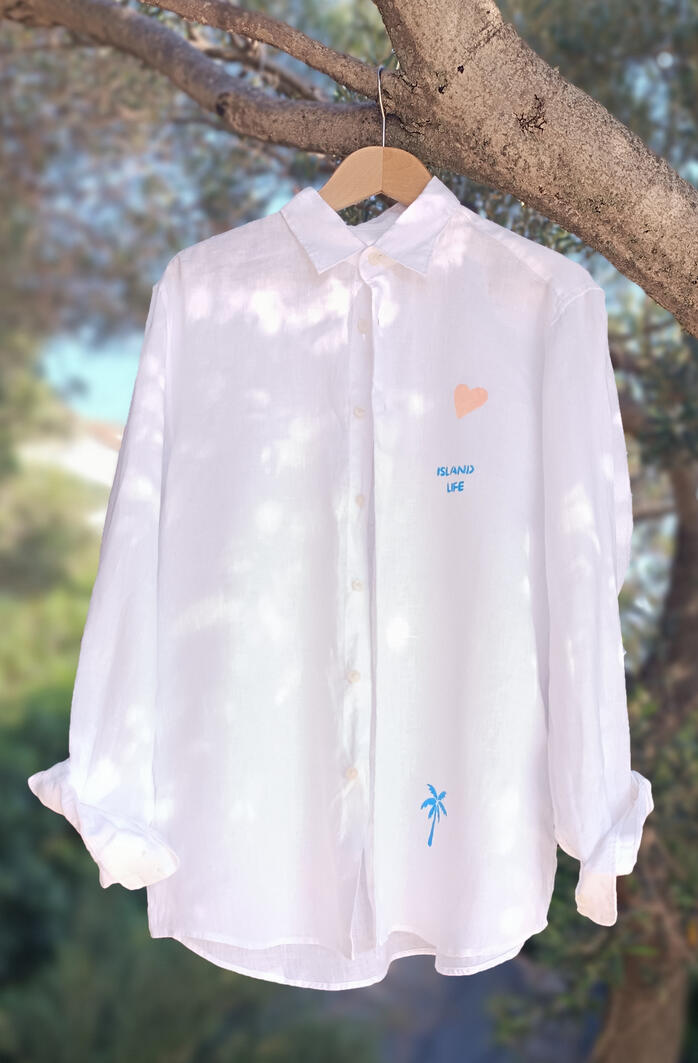 Linen shirts in Korčula store, locally printed Pomalo collection