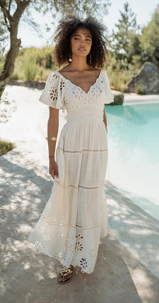 Resort wear and summer dresses in a Korčula concept store with flowing silhouettes