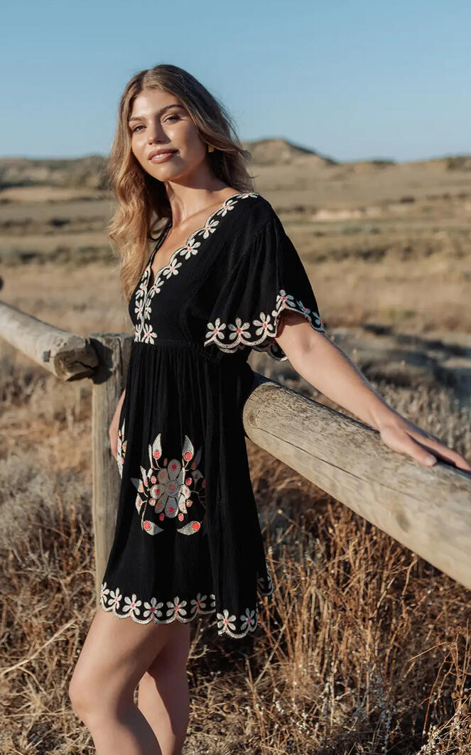 Resort wear and summer dresses in a Korčula concept store with flowing silhouettes